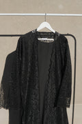 Varelle Netted Lace Abaya 4 Piece Set – Black Modest Abaya with Hijab, Slip Dress & Rope front view – From #1 Shop YAZIR – YAZIRCO